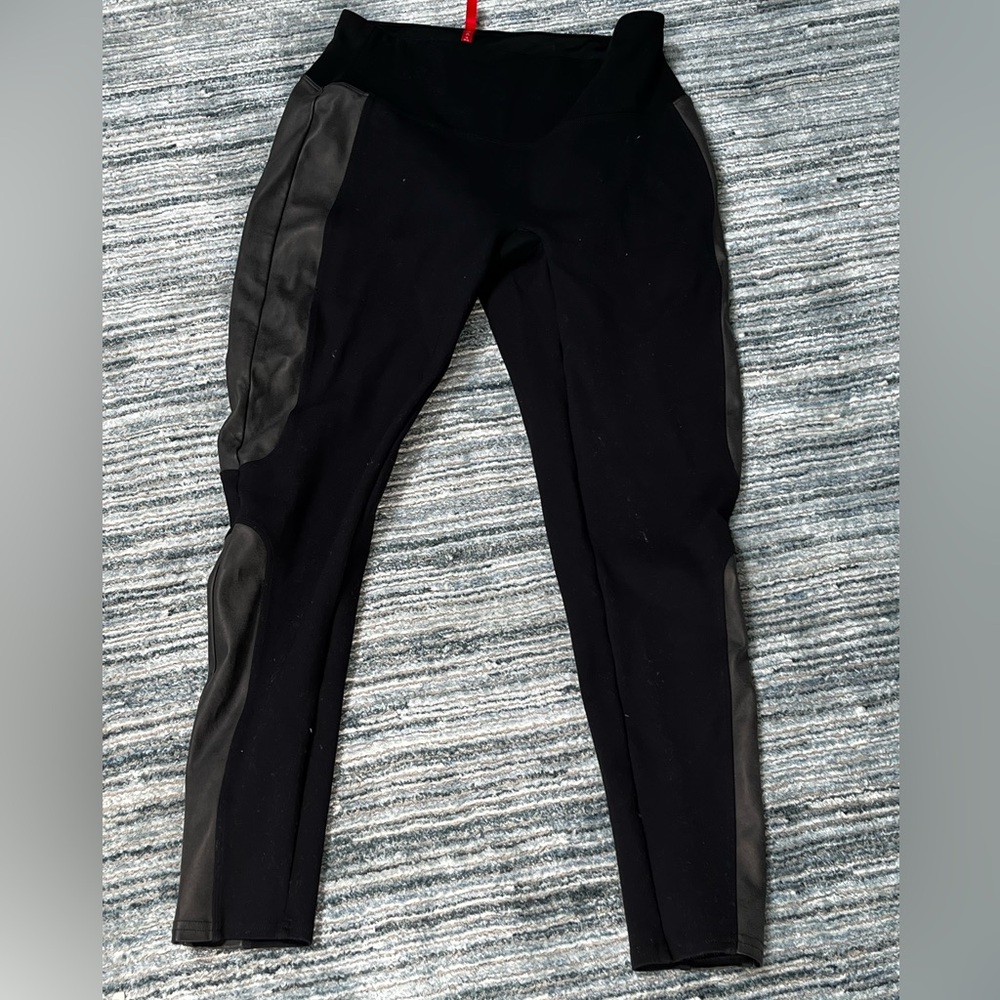 Spanx leggings size medium. Pleather panels at each side